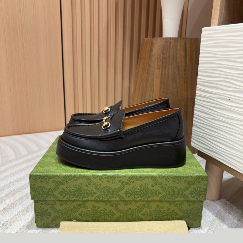 G*u*i leather shoes